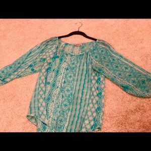 Kokoon blouse.  Tie or tuck.  Sheer flattering